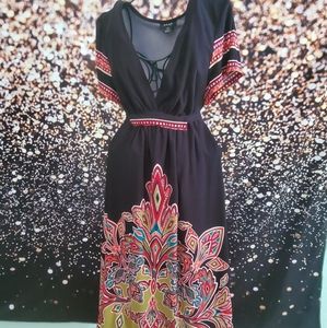 Snap black dress with colorful designs. Size M